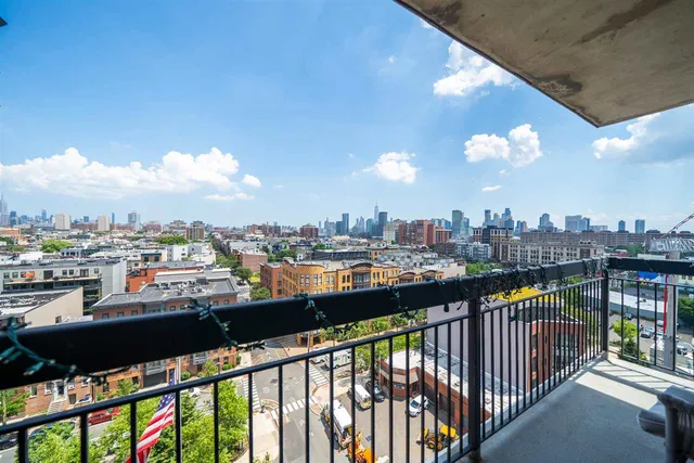 a view of city from a balcony