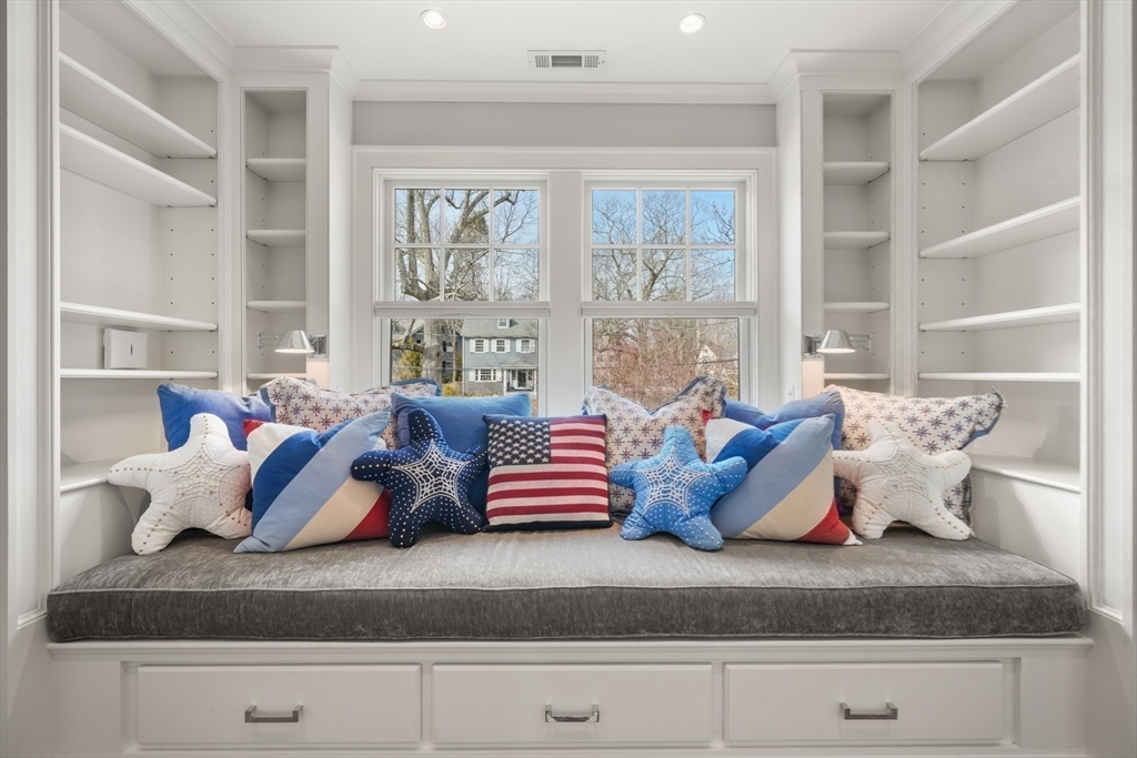21 Cushing Road Wellesley, MA 02481 - Photo 20 of 31 a living room with furniture and a large window