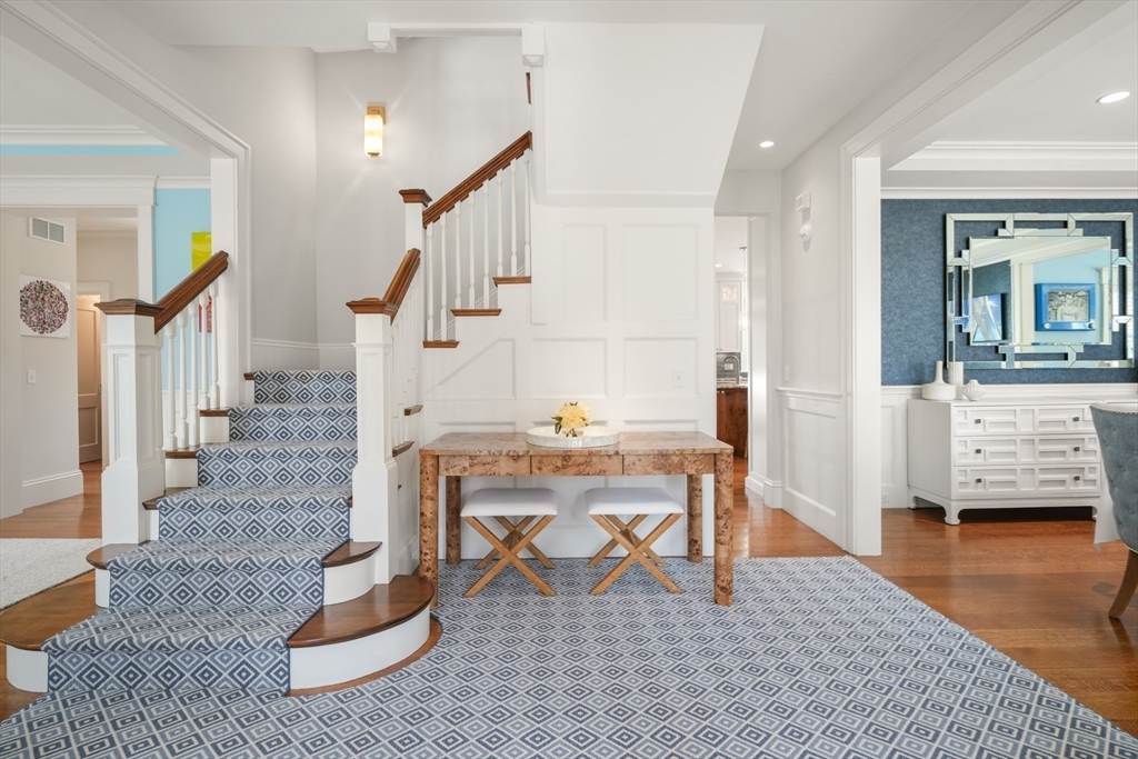 21 Cushing Road Wellesley, MA 02481 - Photo 3 of 31 a view of hall way with furniture and stairs