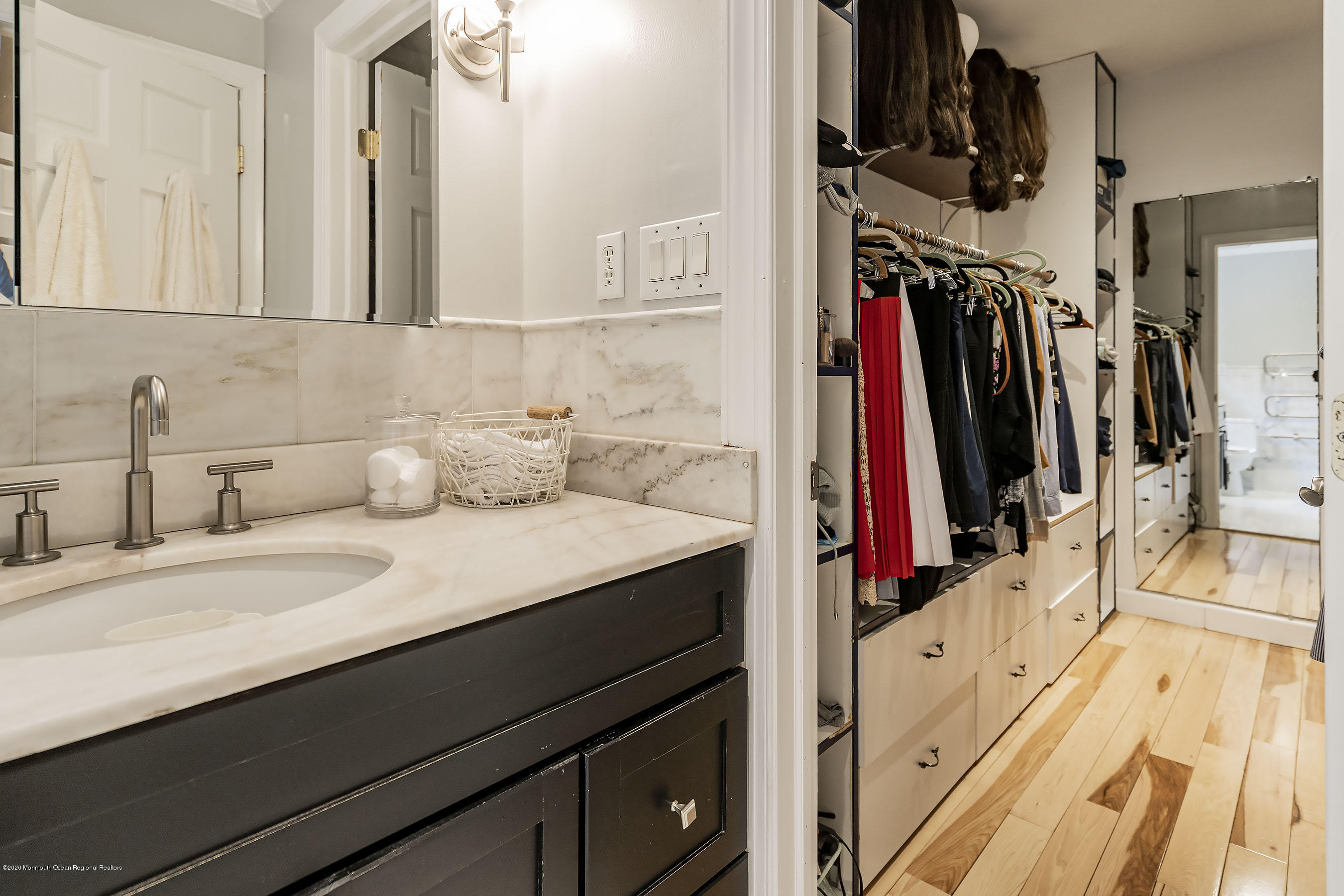 702 Green Valley Road Jackson, NJ 08527 - Photo 28 of 37 a view of walk in closet with clothes