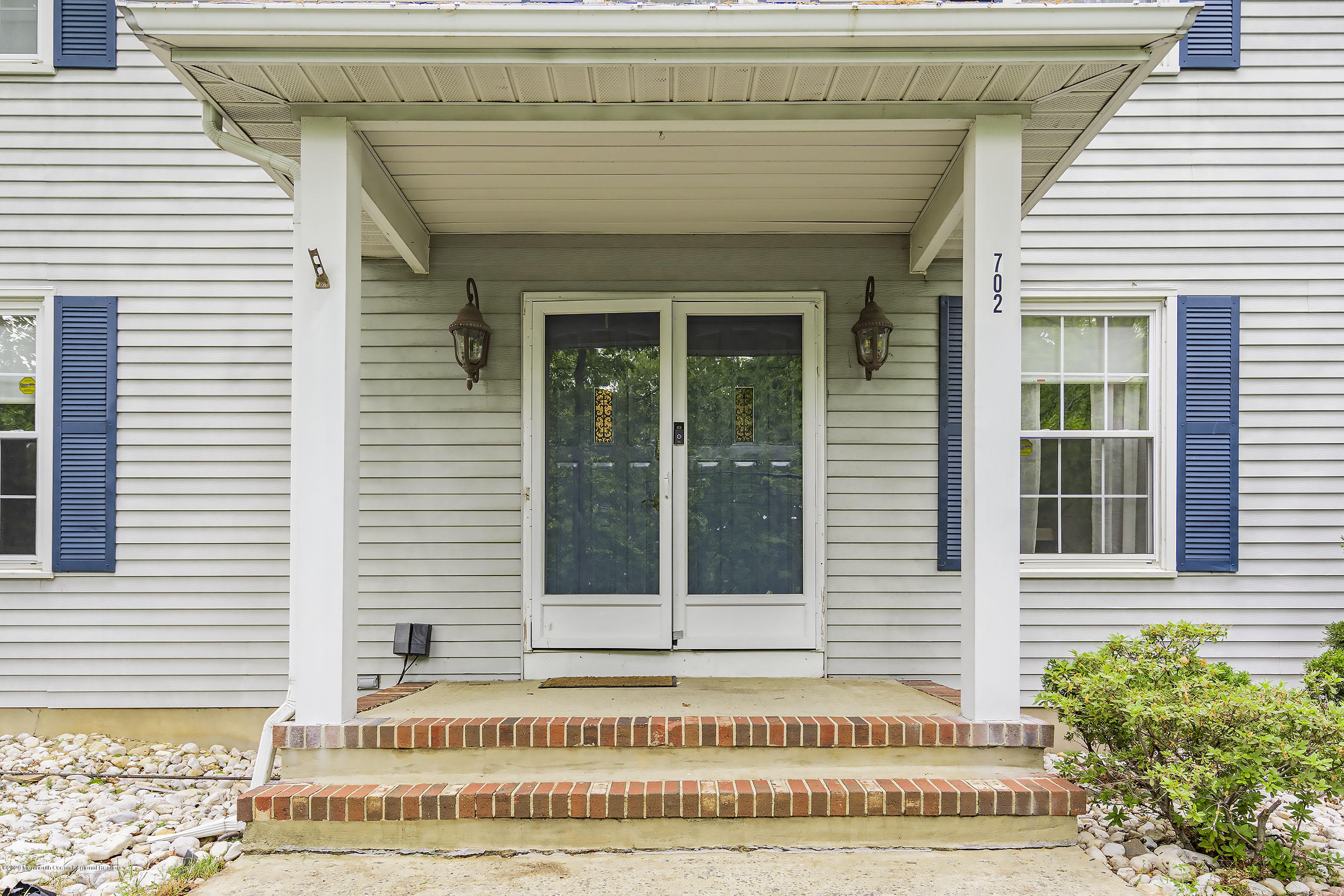 702 Green Valley Road Jackson, NJ 08527 - Photo 3 of 37 a view of a house with a window and stairs