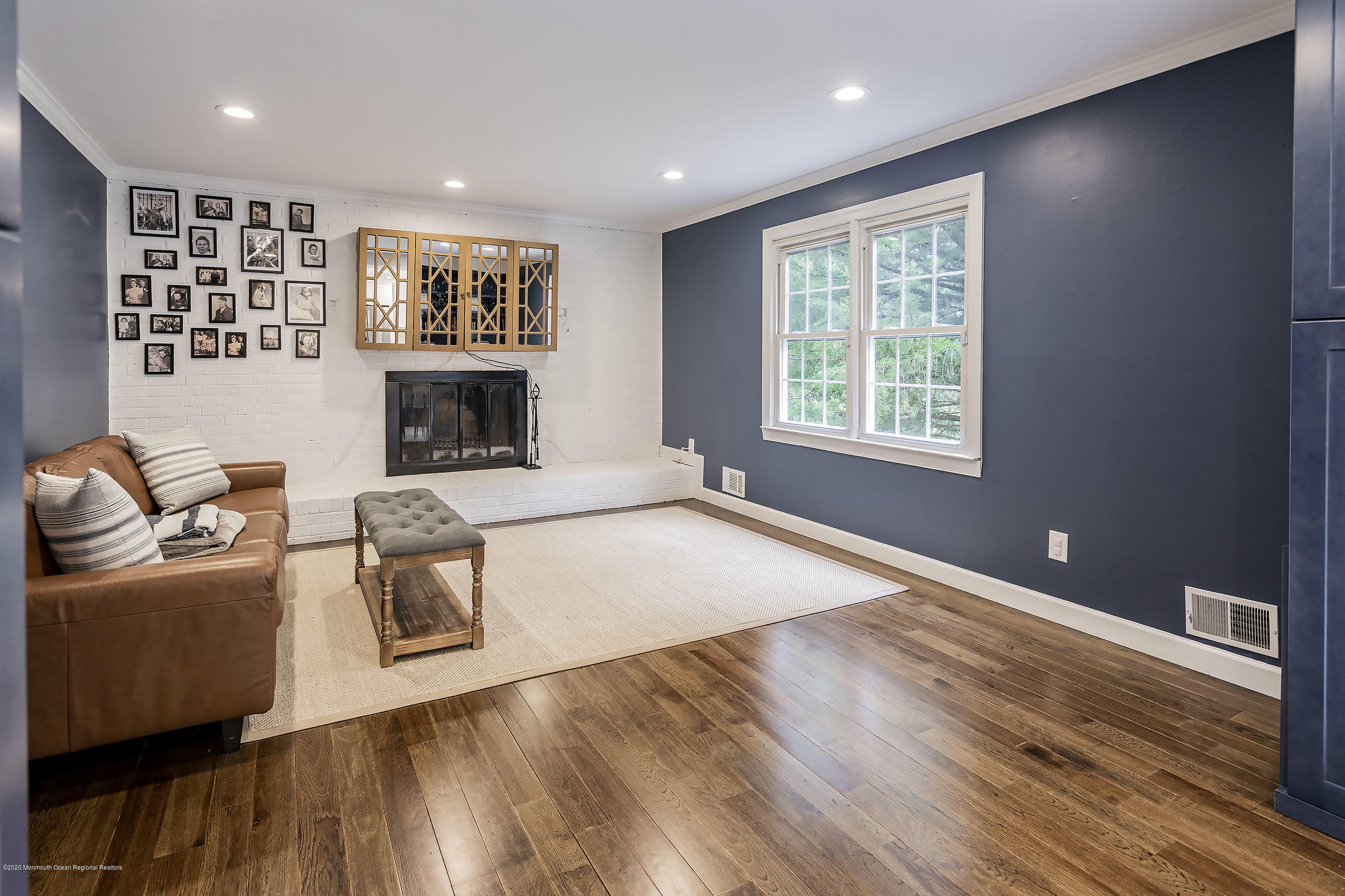 702 Green Valley Road Jackson, NJ 08527 - Photo 10 of 37 a living room with furniture and a fireplace