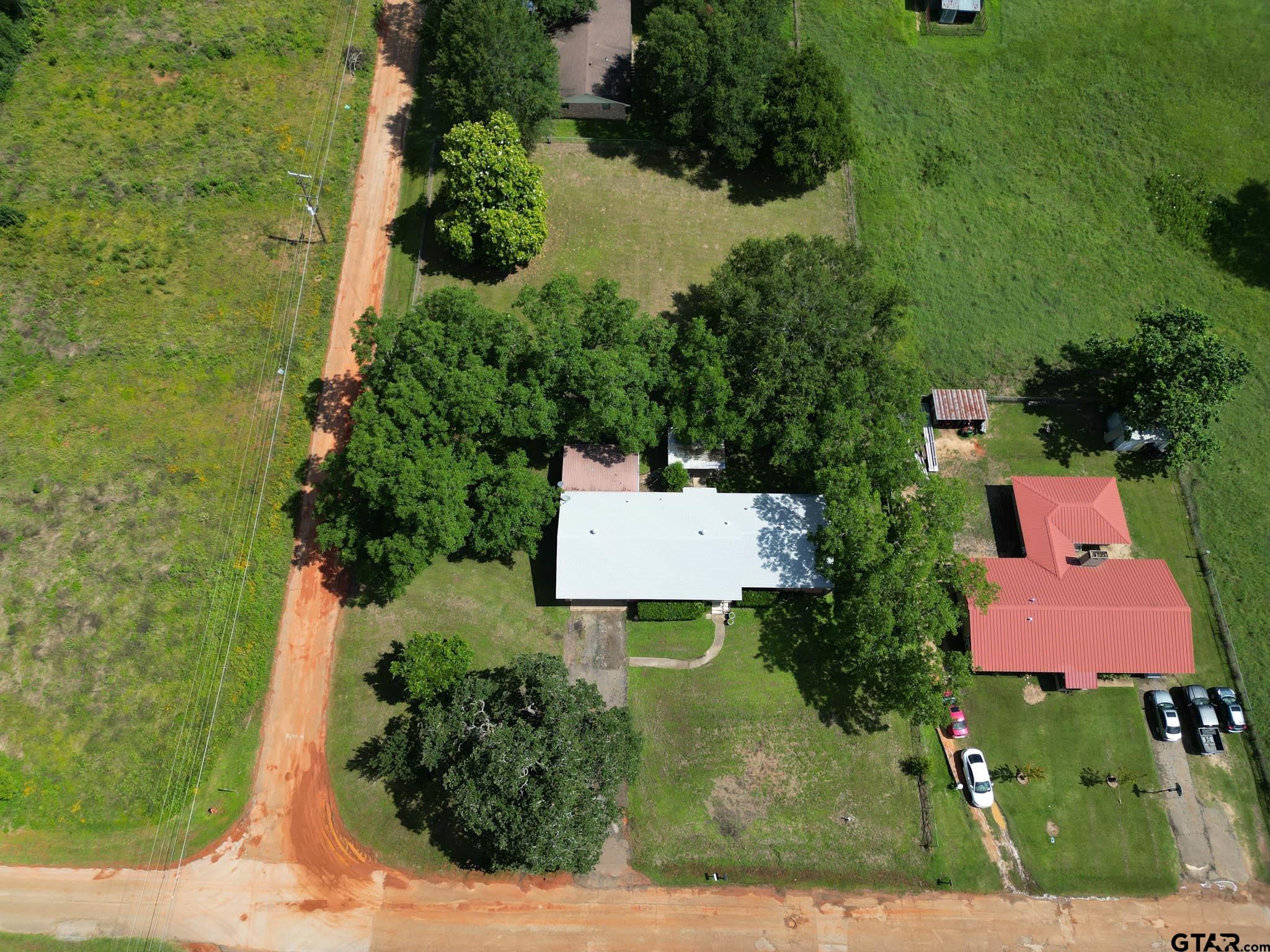 126 Jordan Street Rusk, TX 75785 - Photo 35 of 39 an aerial view of a house with a yard