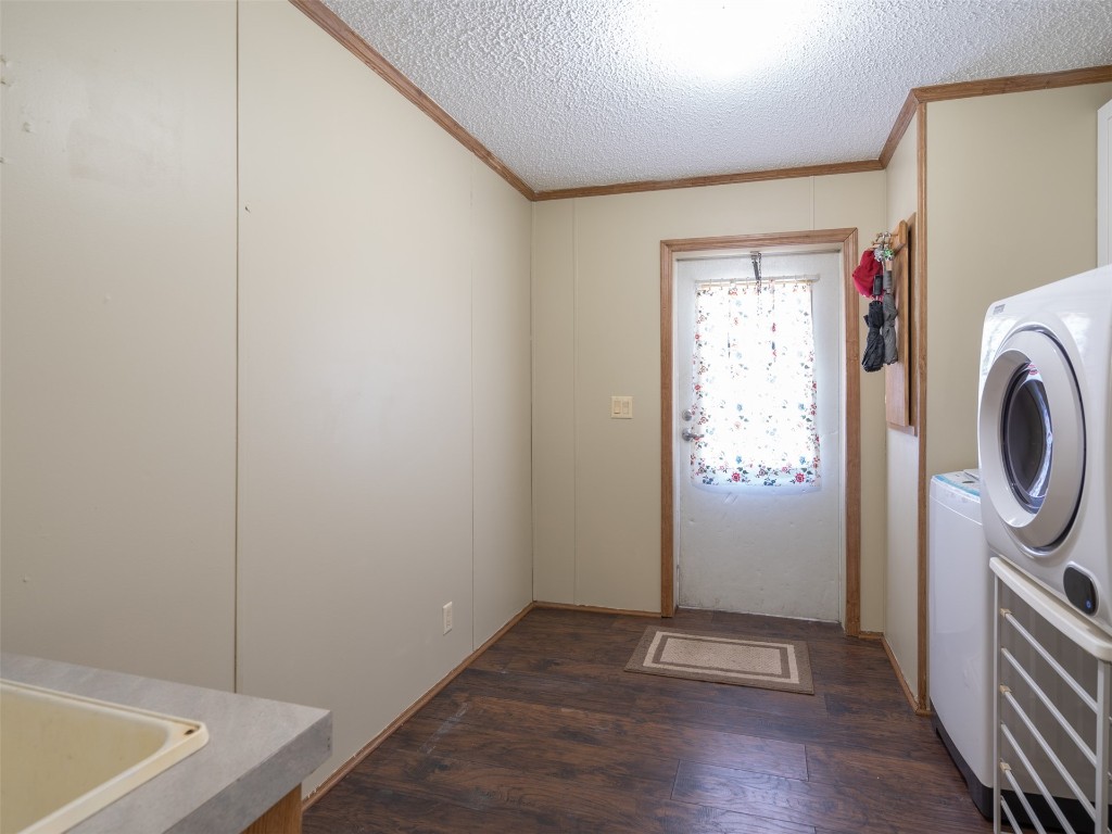 54598 Sheffield Road Callahan, FL 32011 - Photo 26 of 36 a view of bathroom with washer and dryer