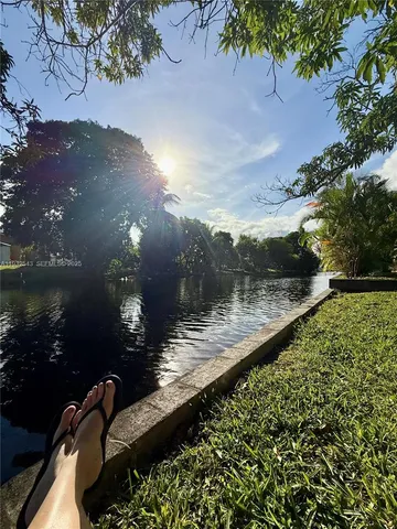 a view of a lake from a balcony