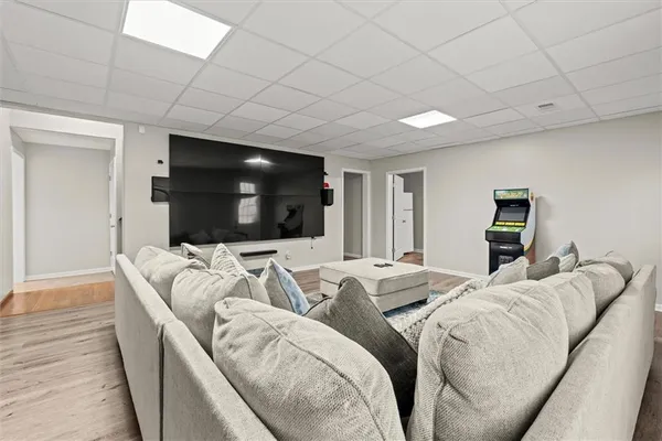 a view of a room with wooden floor