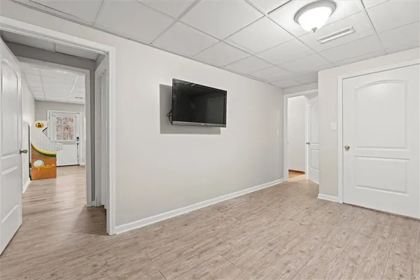 a balcony with wooden floor