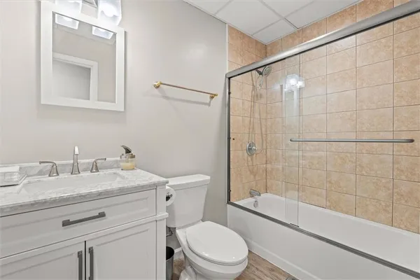 a picture of a bathroom with a sink