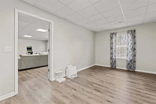 a view of a lake with a yard