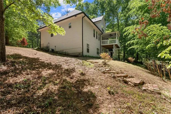 an aerial view of a house with a garden