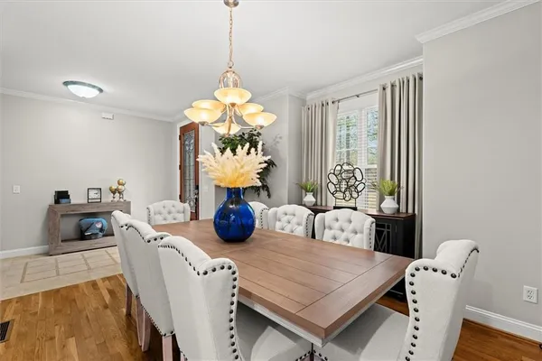 a view of a dining room and a table