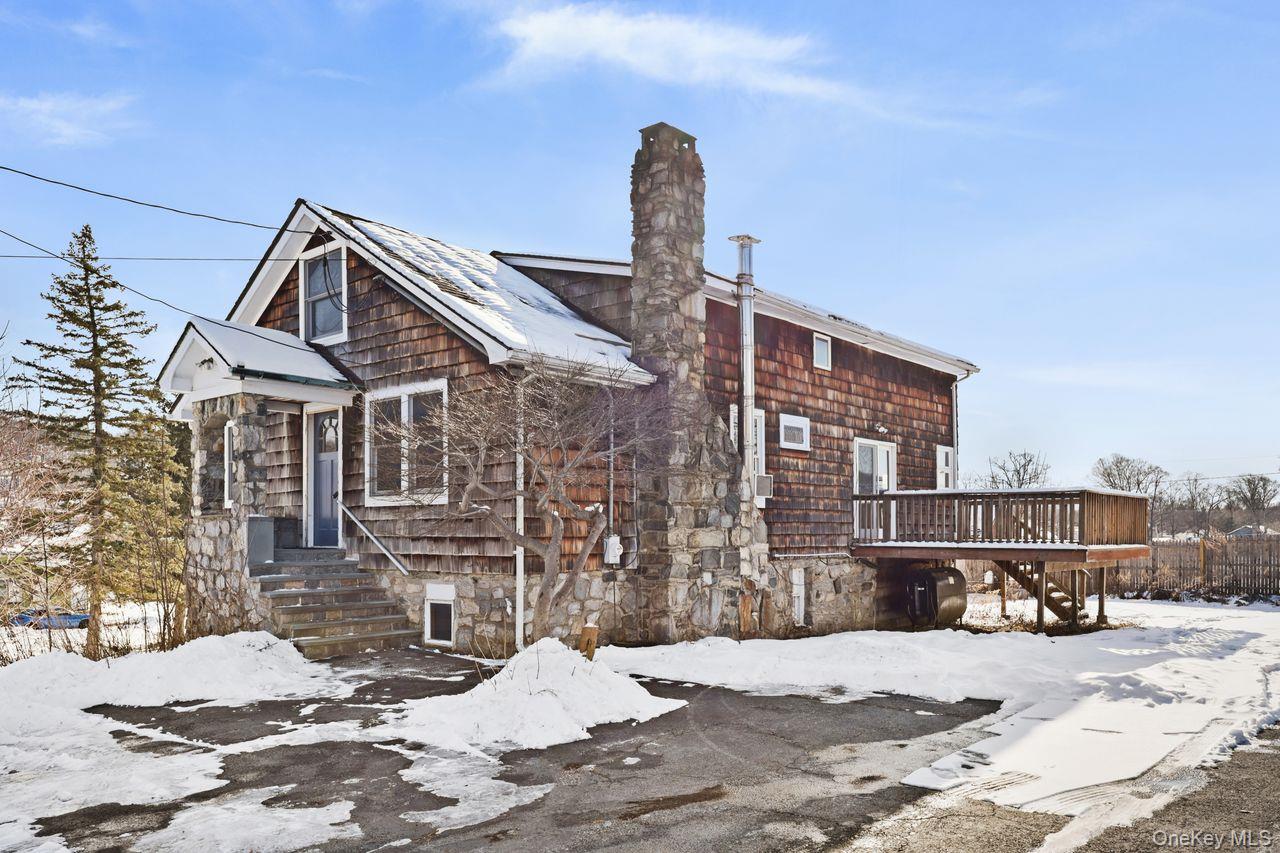 a view of a house with wooden roof