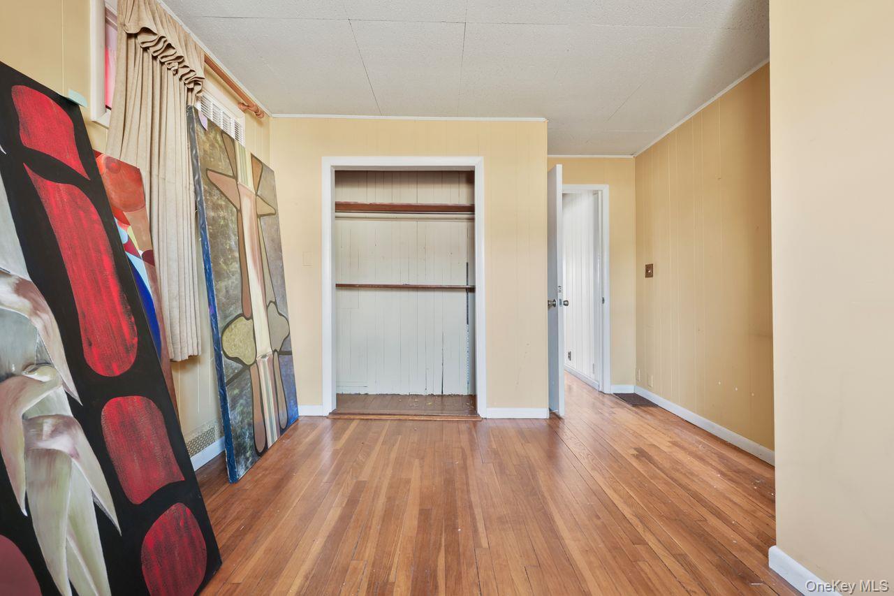12 Sebago Road Carmel, NY 10512 - Photo 13 of 39 a view of front door with wooden floor and stairs