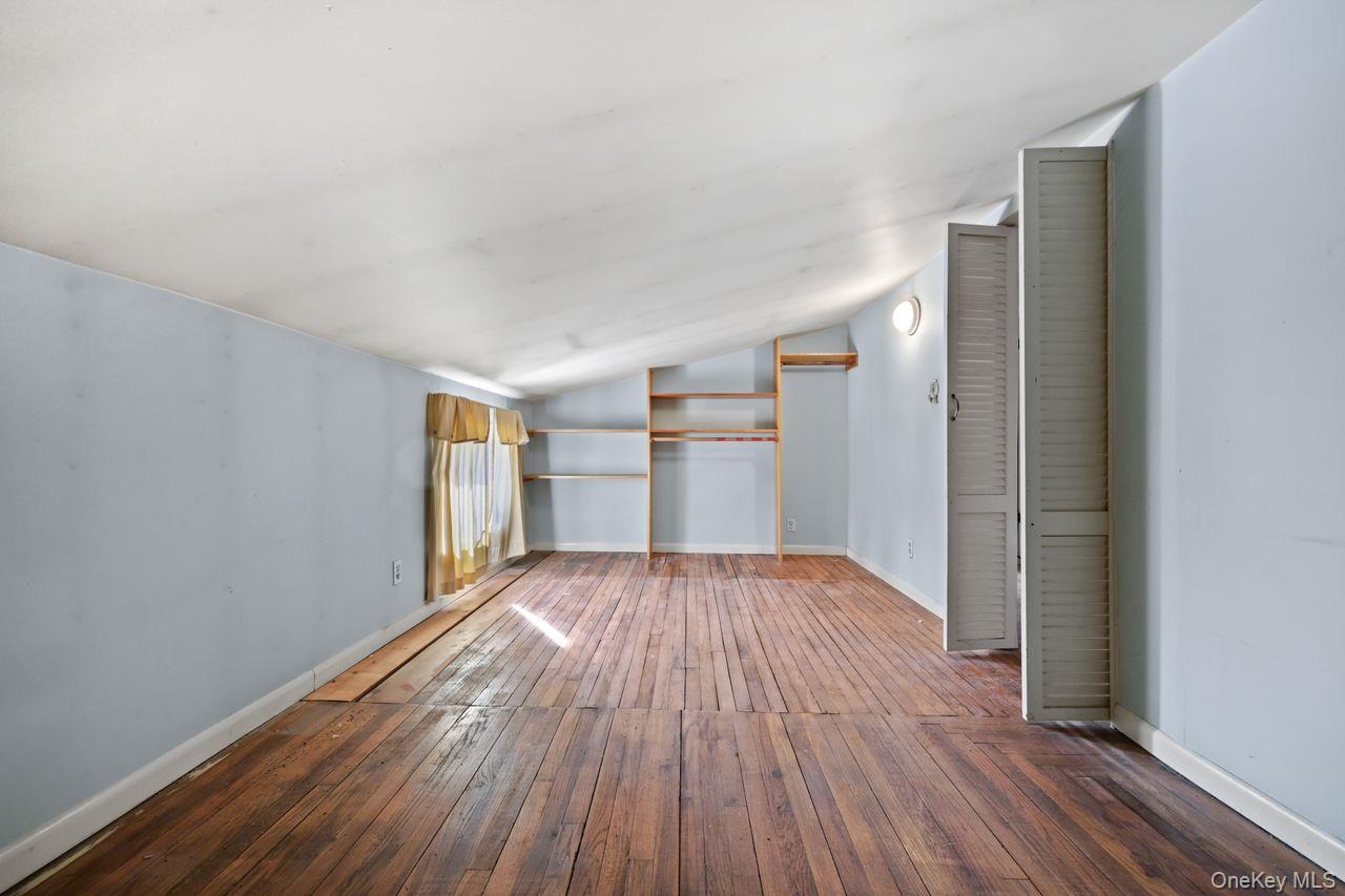 12 Sebago Road Carmel, NY 10512 - Photo 23 of 39 a view of empty room with wooden floor
