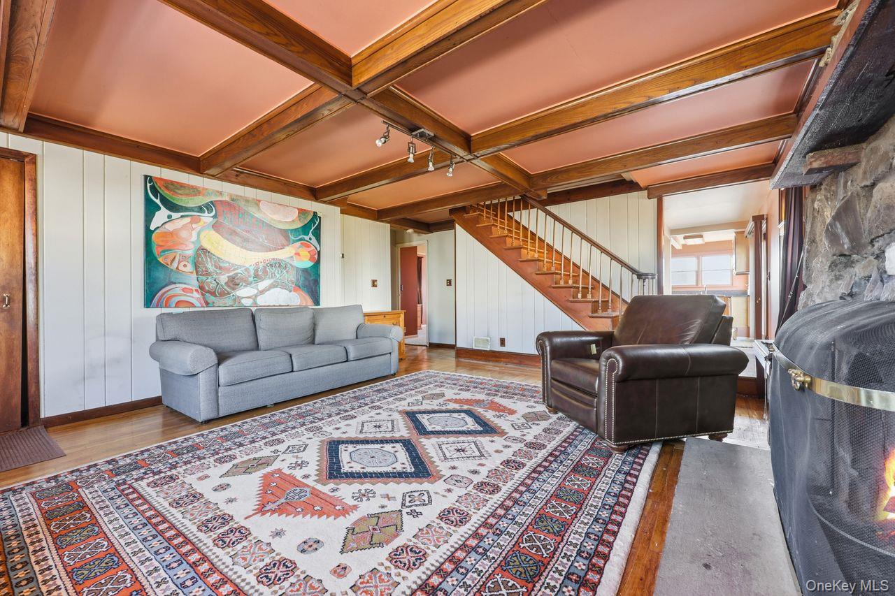 12 Sebago Road Carmel, NY 10512 - Photo 3 of 39 a living room with furniture and a rug