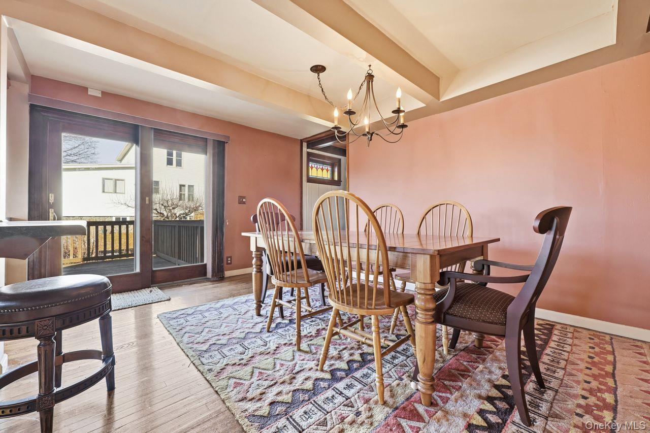 12 Sebago Road Carmel, NY 10512 - Photo 9 of 39 a view of a dining room with furniture window and wooden floor