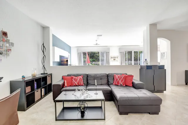 a living room with furniture and a couch