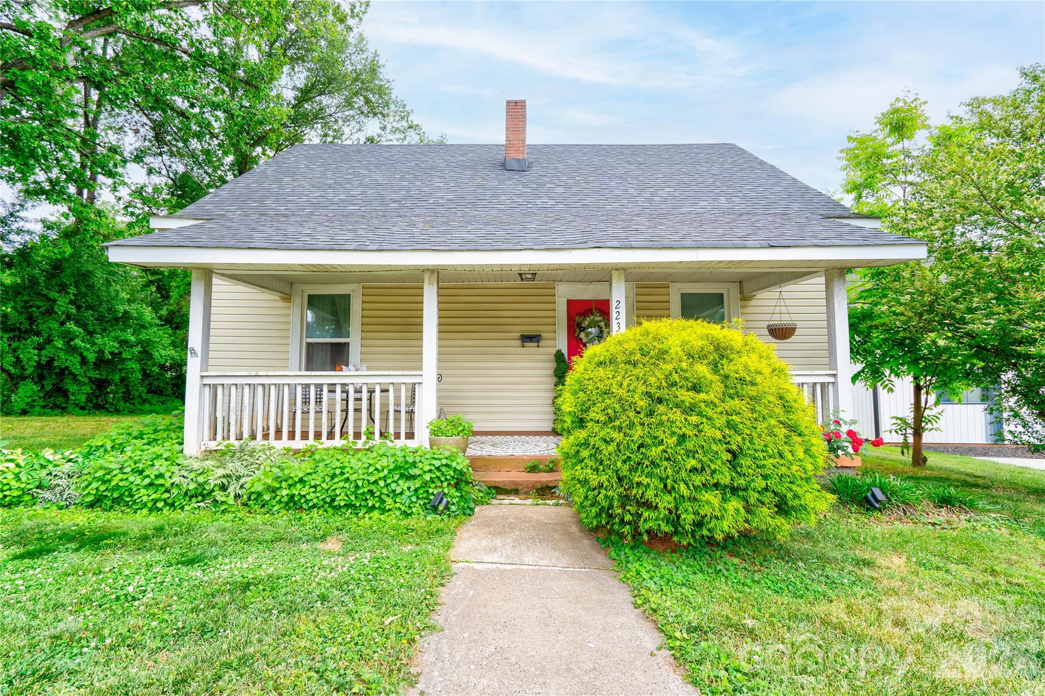 223 Waco Road Kings Mountain, NC 28086 - Photo 2 of 22 a house view with a garden space
