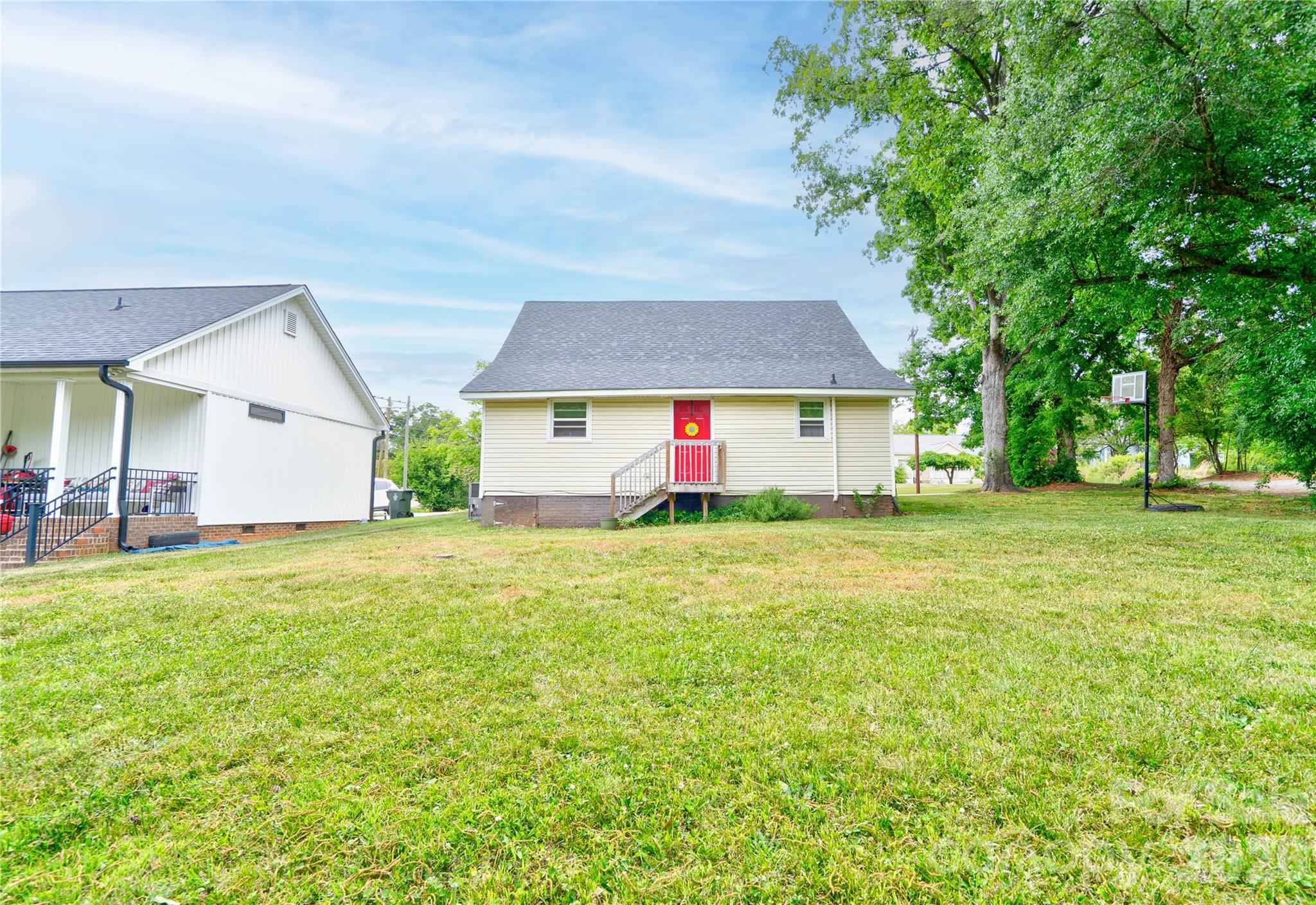 223 Waco Road Kings Mountain, NC 28086 - Photo 21 of 22 a front view of house with yard and trees