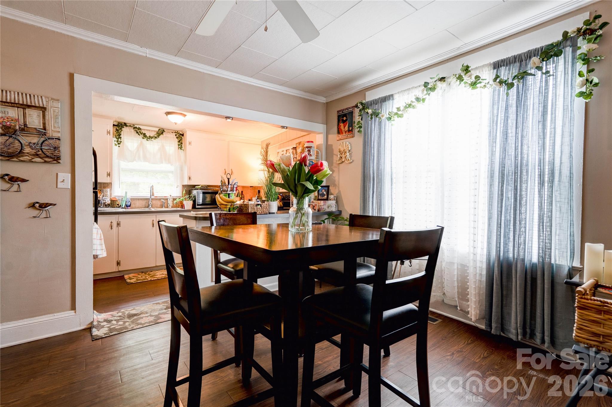 223 Waco Road Kings Mountain, NC 28086 - Photo 8 of 22 a view of a dining room with furniture window and wooden floor