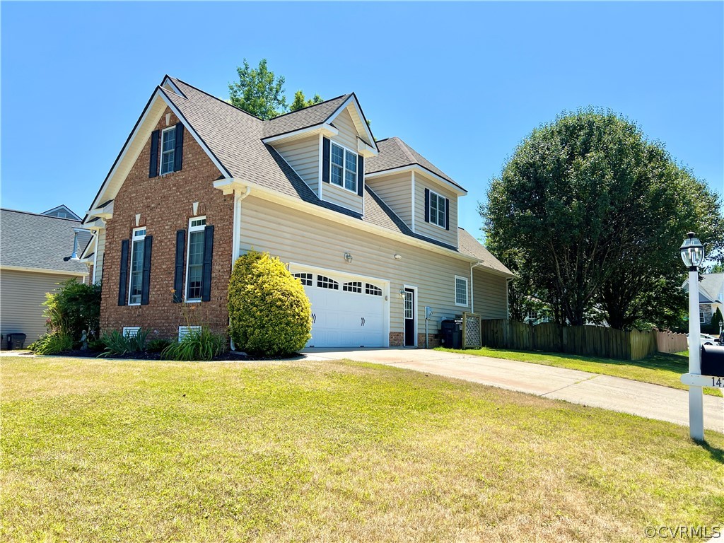 14701 Yarcombe Road Midlothian, VA 23112 - Photo 2 of 44 a front view of a house with a yard