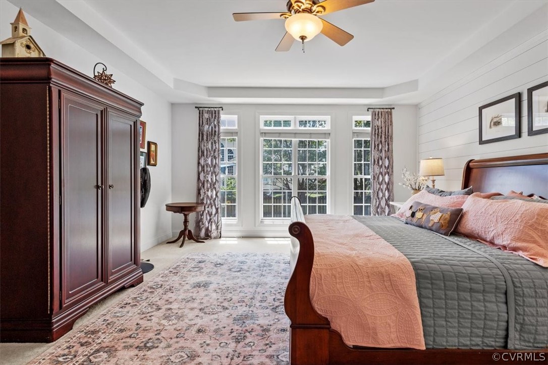 14701 Yarcombe Road Midlothian, VA 23112 - Photo 21 of 44 a bedroom with a bed and glass door