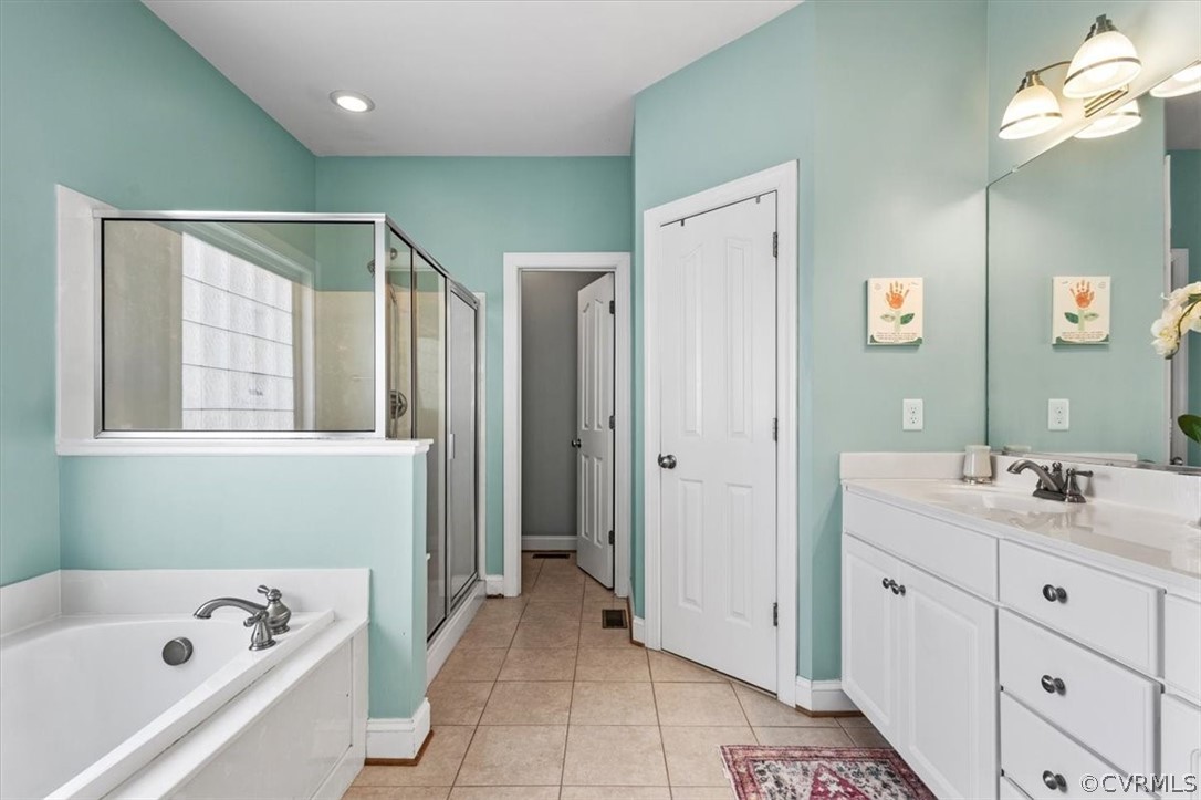14701 Yarcombe Road Midlothian, VA 23112 - Photo 23 of 44 a bathroom with a tub sink and mirror