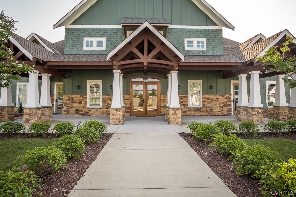 14701 Yarcombe Road Midlothian, VA 23112 - Photo 40 of 44 a front view of a house with garden