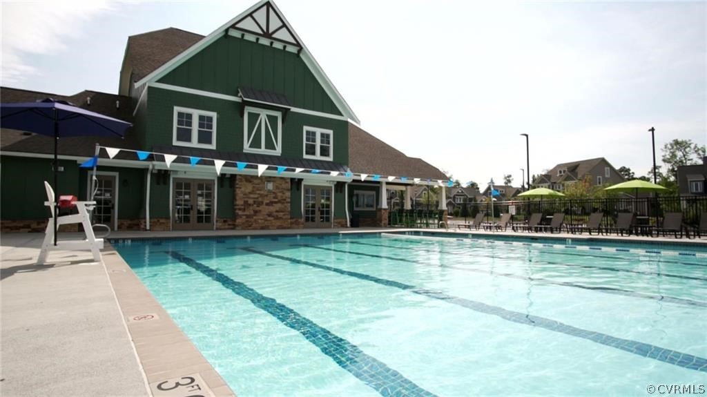 14701 Yarcombe Road Midlothian, VA 23112 - Photo 41 of 44 a view of a house with a swimming pool