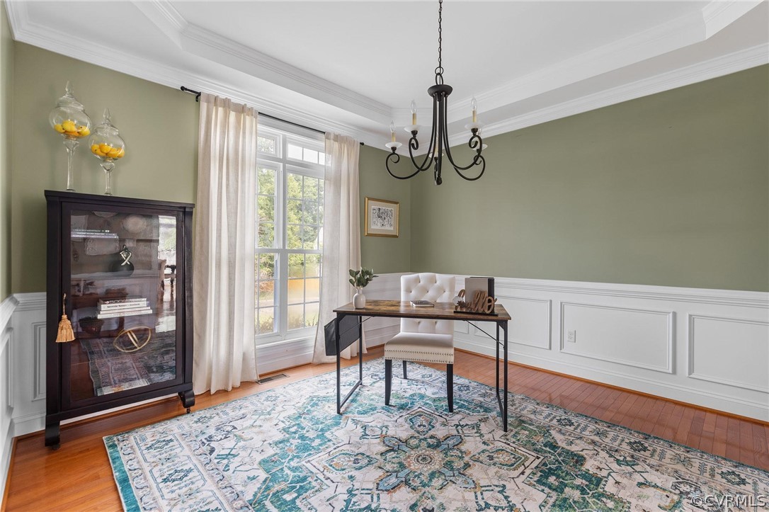 14701 Yarcombe Road Midlothian, VA 23112 - Photo 5 of 44 a living room with a couch and wooden floor