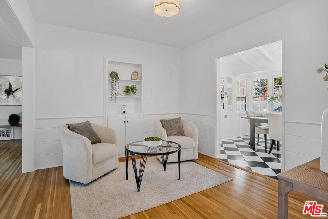 1901 Montecito Drive Glendale, CA 91208 - Photo 11 of 64 a living room with furniture and a wooden floor