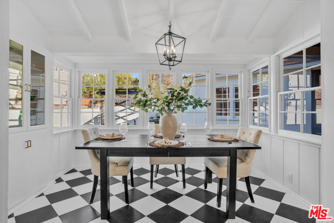 1901 Montecito Drive Glendale, CA 91208 - Photo 12 of 64 a view of a dining room with furniture window and wooden floor