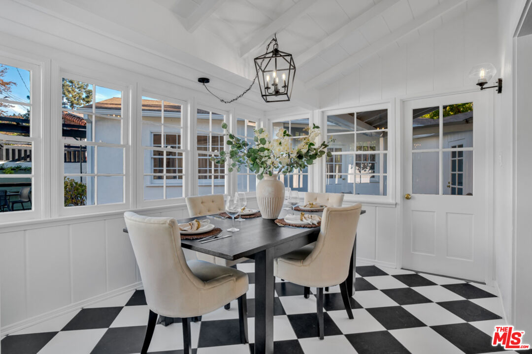 1901 Montecito Drive Glendale, CA 91208 - Photo 13 of 64 a view of a dining room with furniture and chandelier
