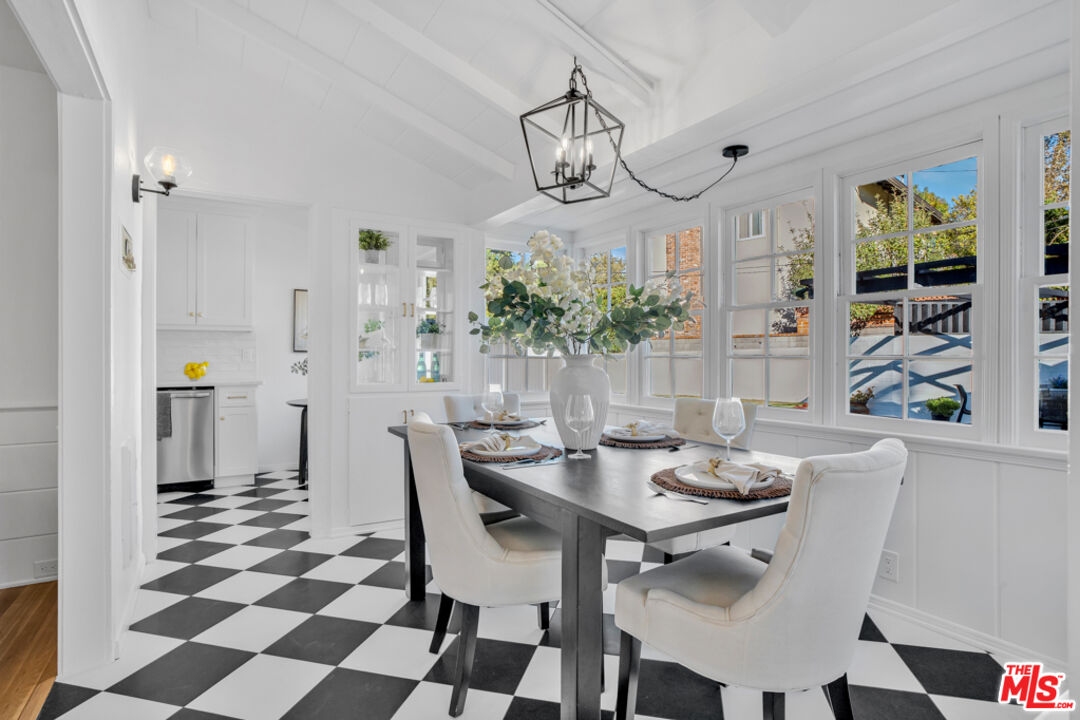 1901 Montecito Drive Glendale, CA 91208 - Photo 14 of 64 a view of a dining room with furniture and chandelier