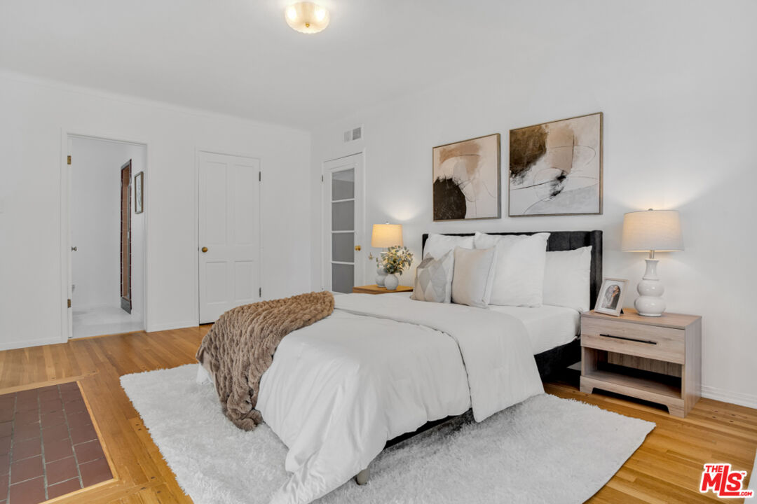 1901 Montecito Drive Glendale, CA 91208 - Photo 31 of 64 a bedroom with a bed and a couch