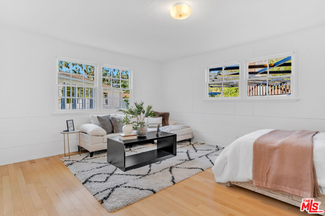 1901 Montecito Drive Glendale, CA 91208 - Photo 37 of 64 a living room with furniture and painting on the wall