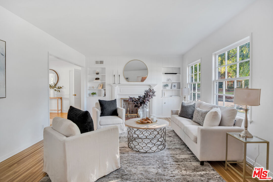 1901 Montecito Drive Glendale, CA 91208 - Photo 4 of 64 a living room with furniture and a large window