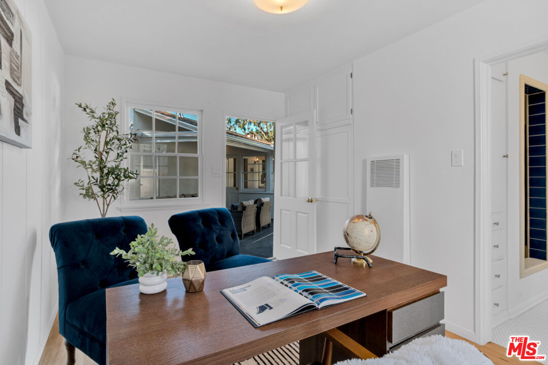 1901 Montecito Drive Glendale, CA 91208 - Photo 41 of 64 a living room with furniture and wooden floor