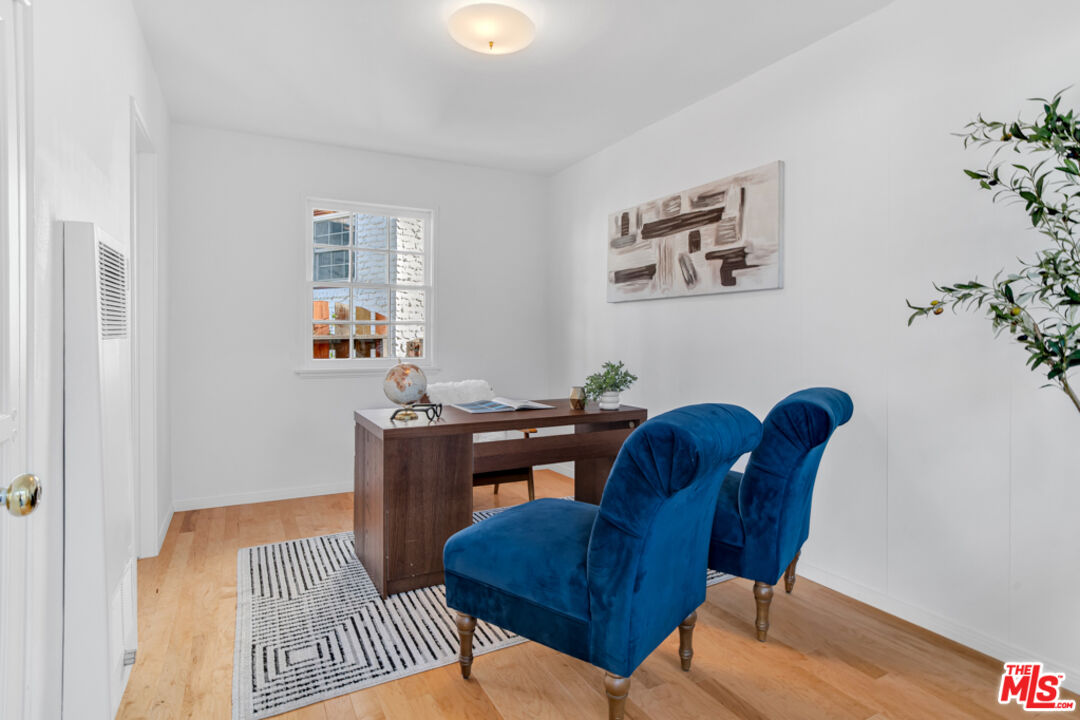 1901 Montecito Drive Glendale, CA 91208 - Photo 42 of 64 a living room with furniture and a window