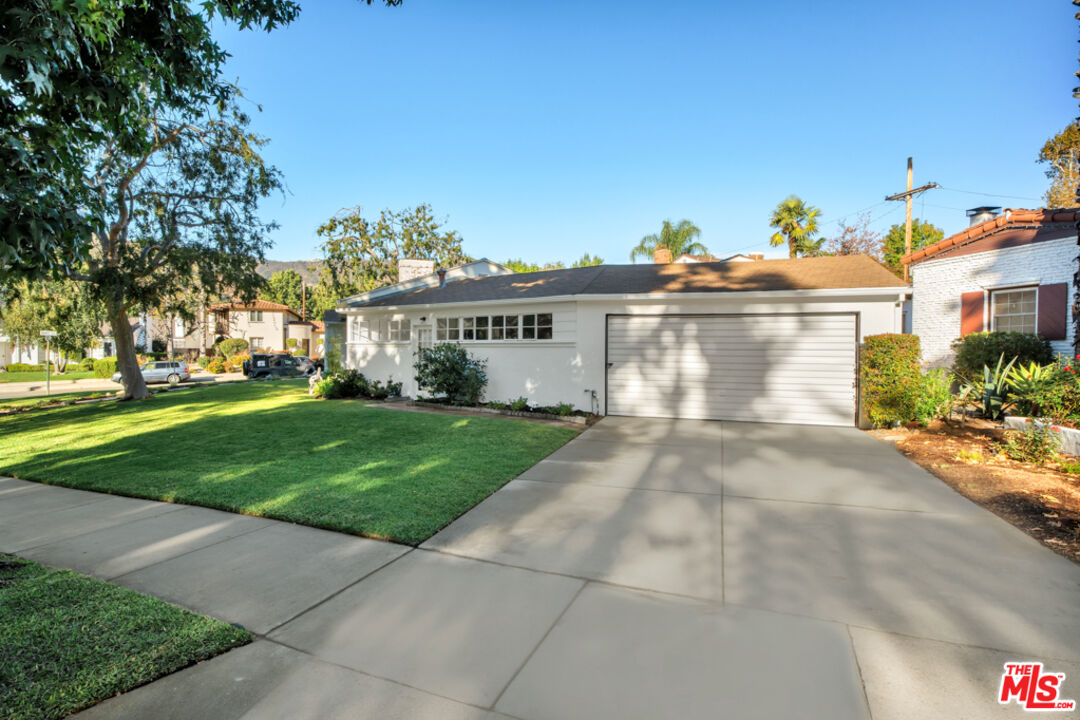 1901 Montecito Drive Glendale, CA 91208 - Photo 54 of 64 a view of a white house with a yard