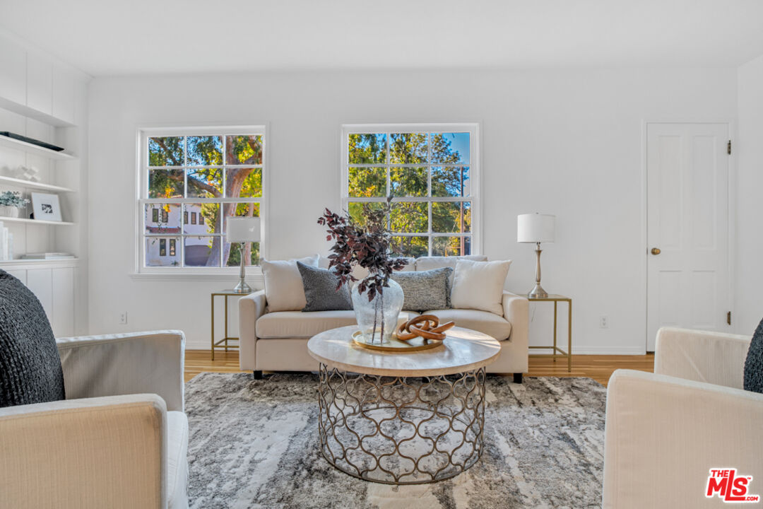 1901 Montecito Drive Glendale, CA 91208 - Photo 6 of 64 a living room with furniture and a large window