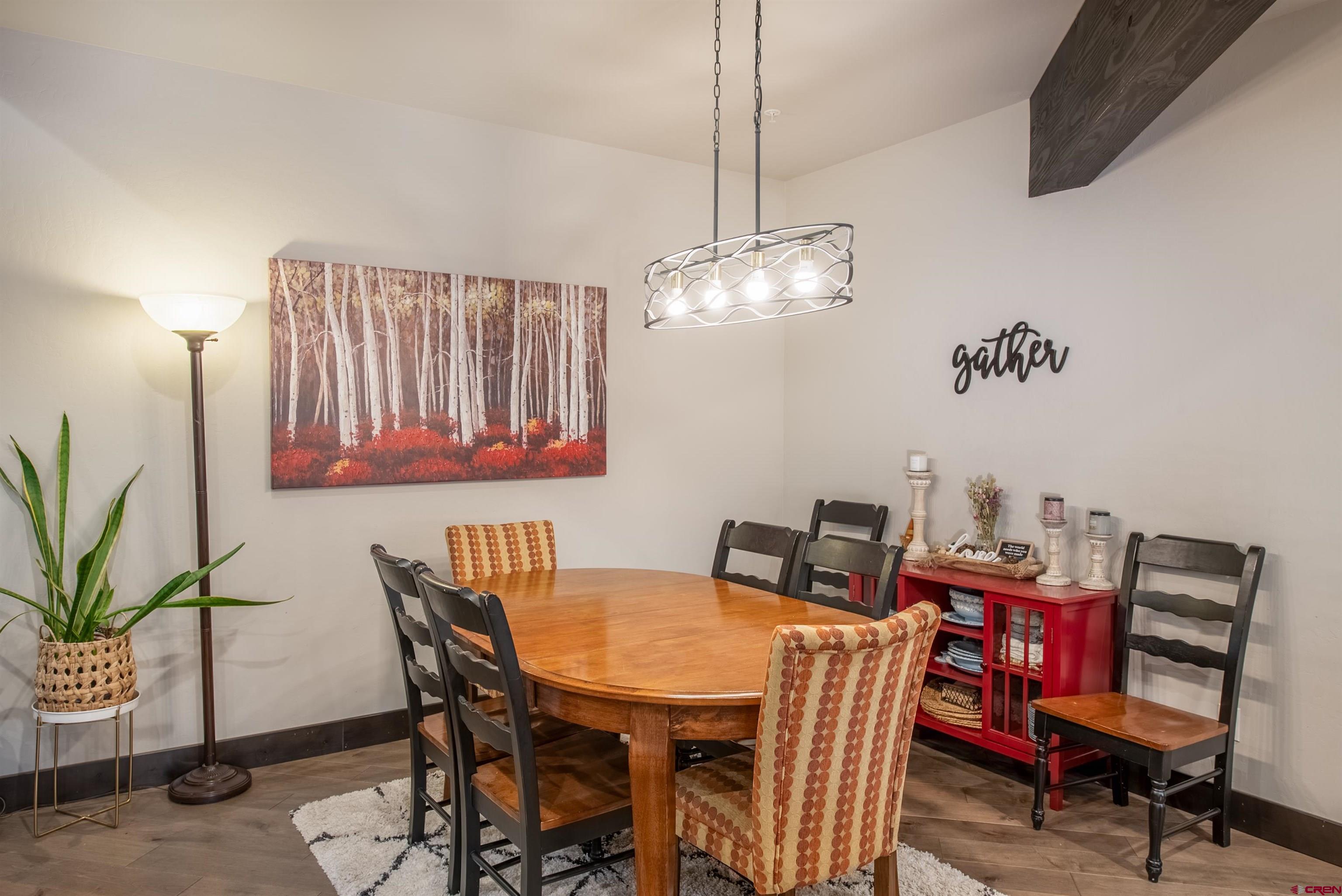 23 Jacquelyn Lane Crested Butte, CO 81224 - Photo 13 of 33 a view of a dining room with furniture and chandelier