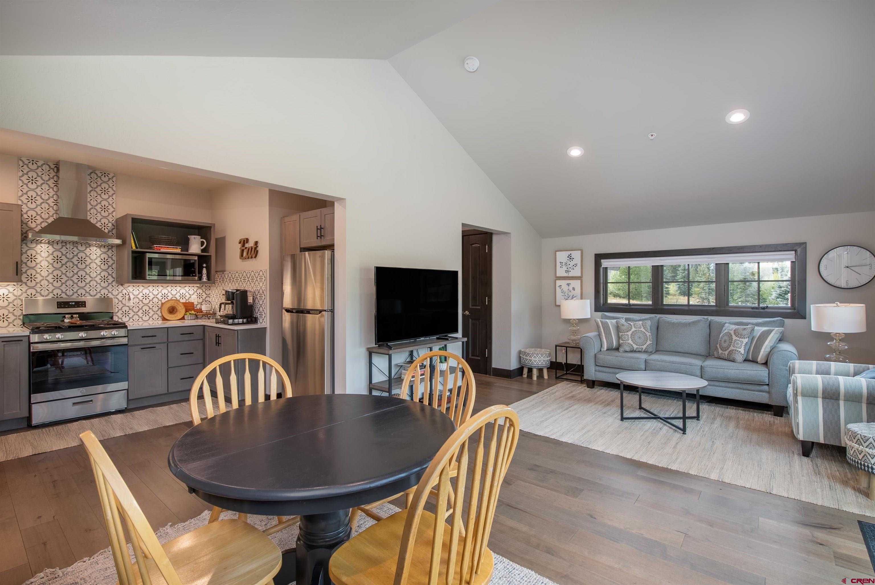 23 Jacquelyn Lane Crested Butte, CO 81224 - Photo 28 of 33 a living room with furniture and a flat screen tv