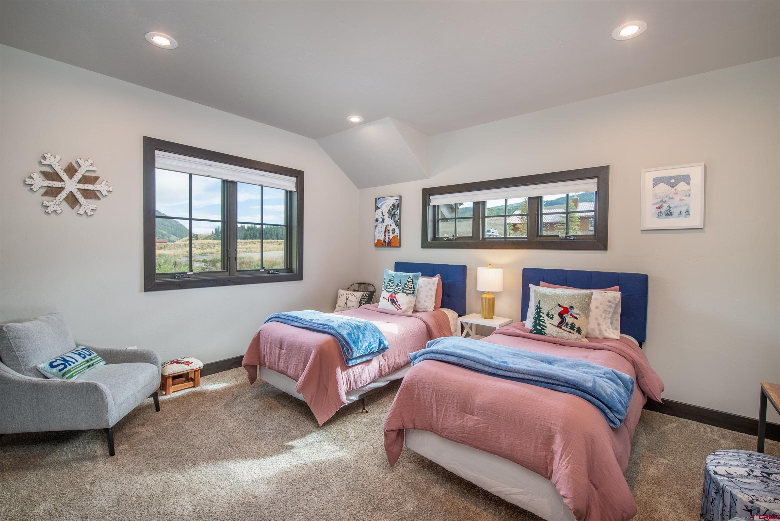 23 Jacquelyn Lane Crested Butte, CO 81224 - Photo 32 of 33 a bedroom with two beds and a window