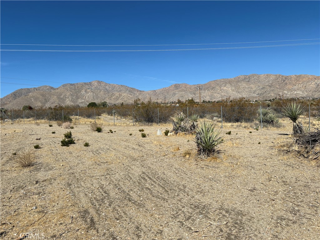 9825 Fobes Road Morongo Valley, CA 92256 - Photo 22 of 28 a view of mountain with sunset