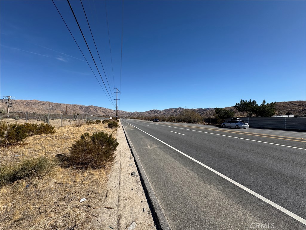 9825 Fobes Road Morongo Valley, CA 92256 - Photo 9 of 28 a view of a road with a ocean view