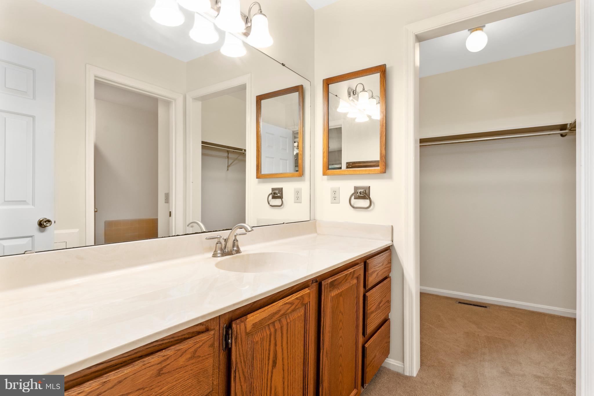 8484 Passapatanzy Road King George, VA 22485 - Photo 18 of 30 His/ Her Vanity Rooms & Walk- In Closets