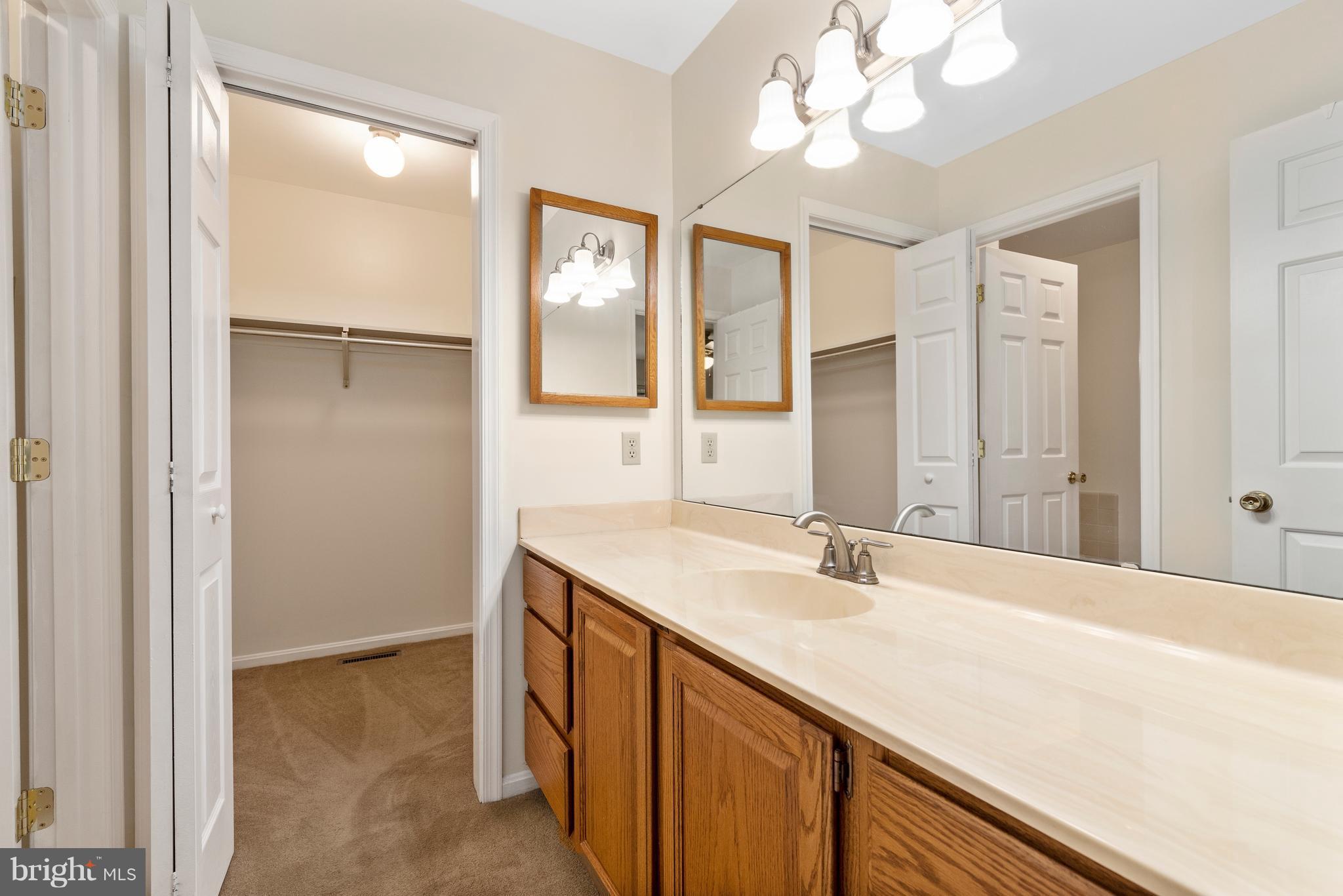 8484 Passapatanzy Road King George, VA 22485 - Photo 20 of 30 His/Her Vanity Rooms & Walk-In Closets