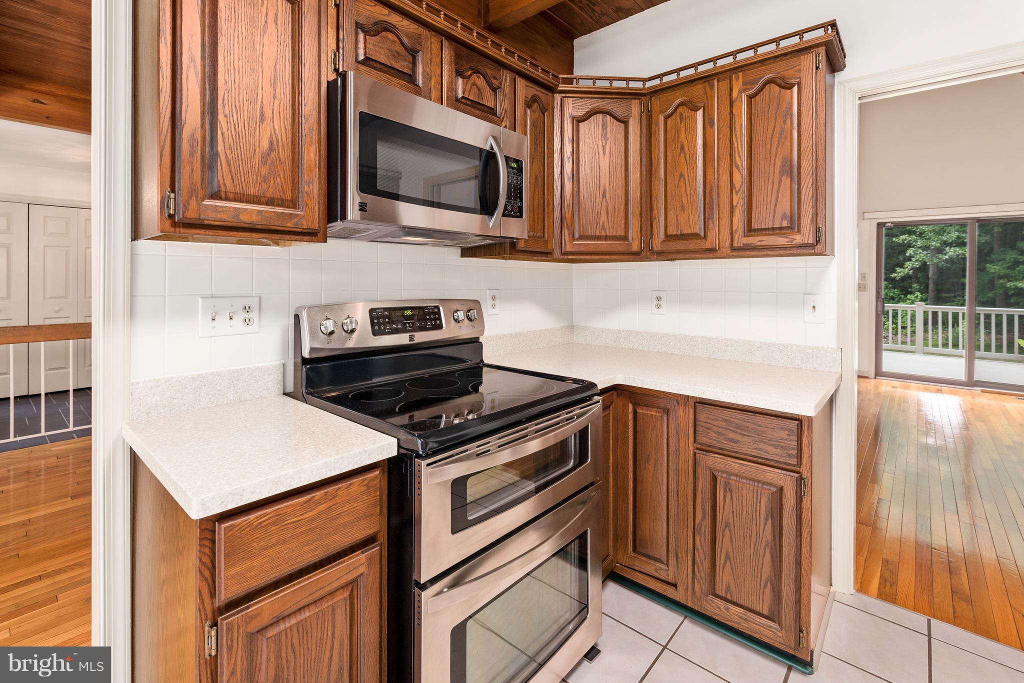 8484 Passapatanzy Road King George, VA 22485 - Photo 7 of 30 Flat Surface Cooking & Built-In Microwave