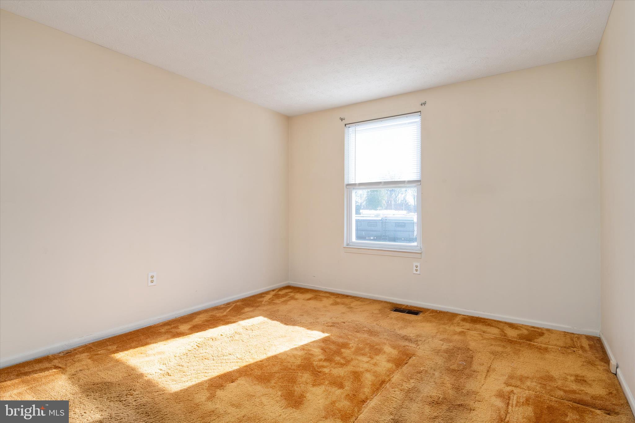 226 Compass Road Baltimore, MD 21221 - Photo 24 of 35 an empty room with a window